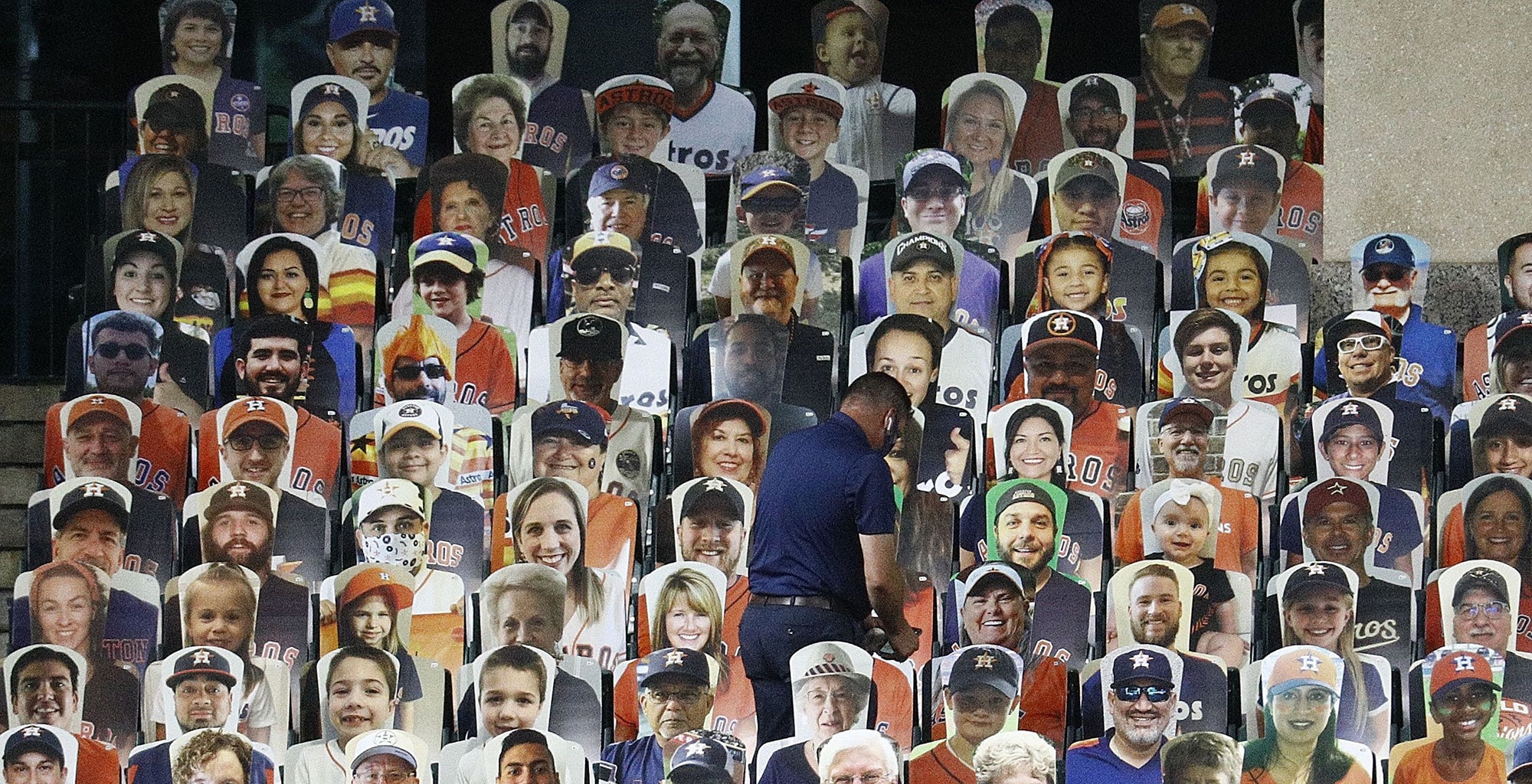Seattle Mariners v Houston Astros HOUSTON, TEXAS - JULY 27: A Houston Astros employee looks for a home run ball hit by Alex Bregman #2 of the Houston Astros in the Crawford Boxes during the third inning against the Seattle Mariners at Minute Maid Park on July 27, 2020 in Houston, Texas. (Photo by Bob Levey/Getty Images)